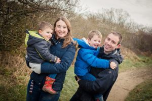 family looking at camera