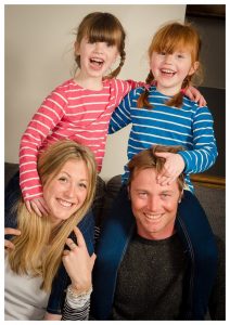 auntie and uncle get cuddles with twins