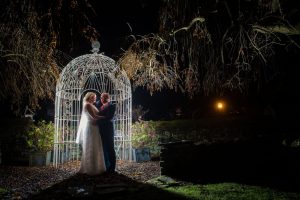 Night time shot at Holdsworth House couple hugging