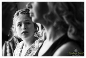 bridemaid admiring the bride