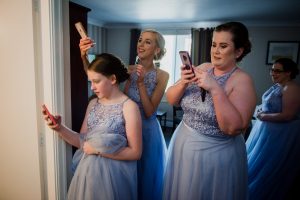 bridesmaids taking photos