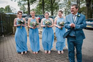 bridesmaids in the wind