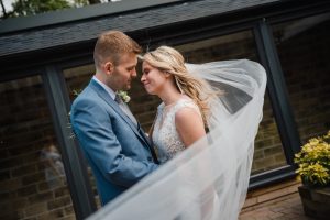 bride and groom with veil 315 restaurant and spa wedding