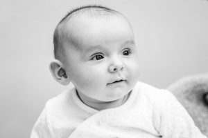 black and white photo of a baby boy