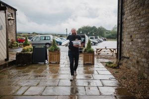 oliver james from Wired arrives with the wedding cakes