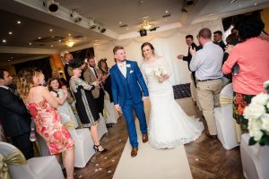 newlyweds leaving the ceremony