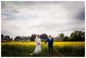 Bride and groom in flaxseed field