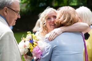 guests congratulate the couple