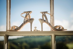 bridal shoes in window sunlight