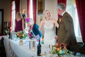 bride and dad embrace