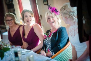 brides mum laughing at grooms speech