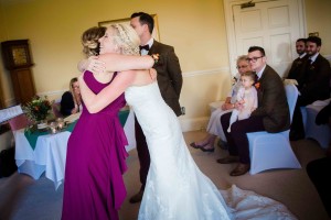 bride hugs her sister