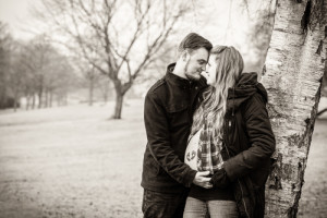 maternity tree leaning couple