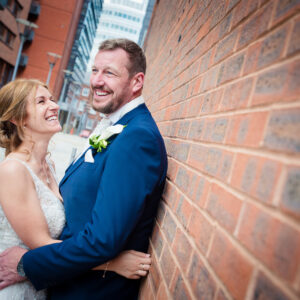bride looking lovingly at new husband