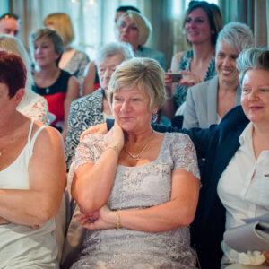 proud mum looks on
