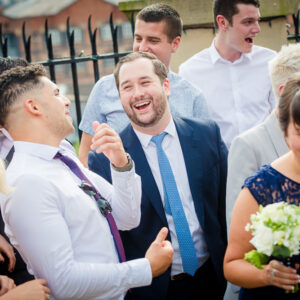 wedding guests laughing