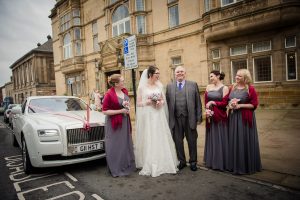 outside venue group with car