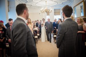 bride and dad process down aisle
