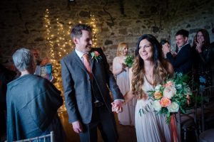 The newlyweds walk out