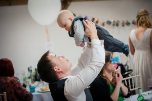baby playing with dad