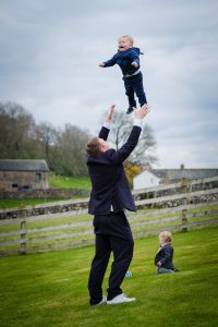 Throwing child up in the air