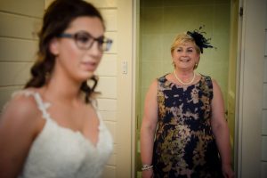 mum of bride admiring the bride