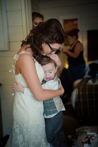 cuddle with the bride, mum