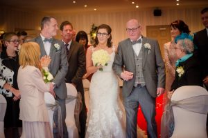 bride and dad on aisle