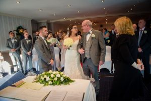 dad gives bride away