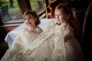 little girls holding dress