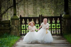flower girls captured running out of church
