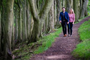 couple walk towards camera
