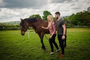 couple and their horse