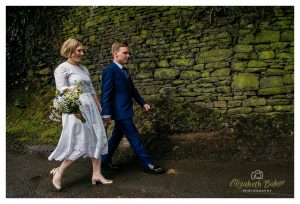 walking from the church, stone wall