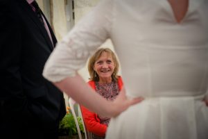 interesting angle through brides arm