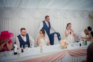 bride is emotional as little sister speaks