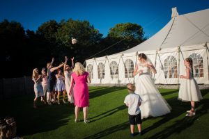 bride throws the bouquet