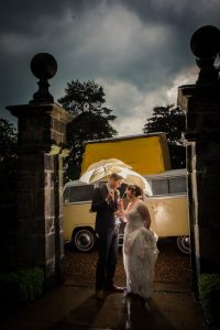 wedding umbrella in storm