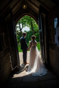 bride and groom leaving church