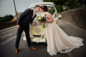 wedding campervan with newlyweds