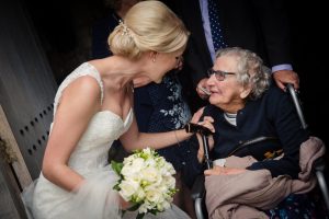 bride greets grandmother