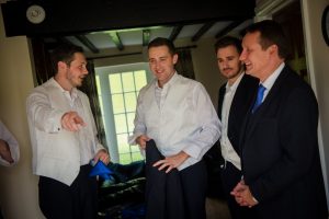 groom and groomsmen getting ready