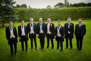 groomsmen looking at camera