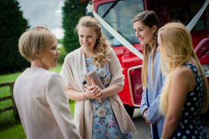 guests waiting for the bus