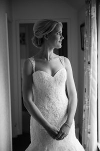 bride looks out of window