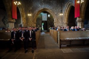 church interior guests waiting for bride