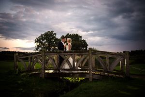 nighttime on the bridge at their wedding