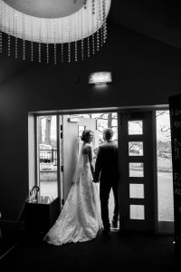 black and white image of newlyweds silhouette