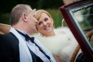 bride looks at groom