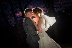 sunset veil blowing couple